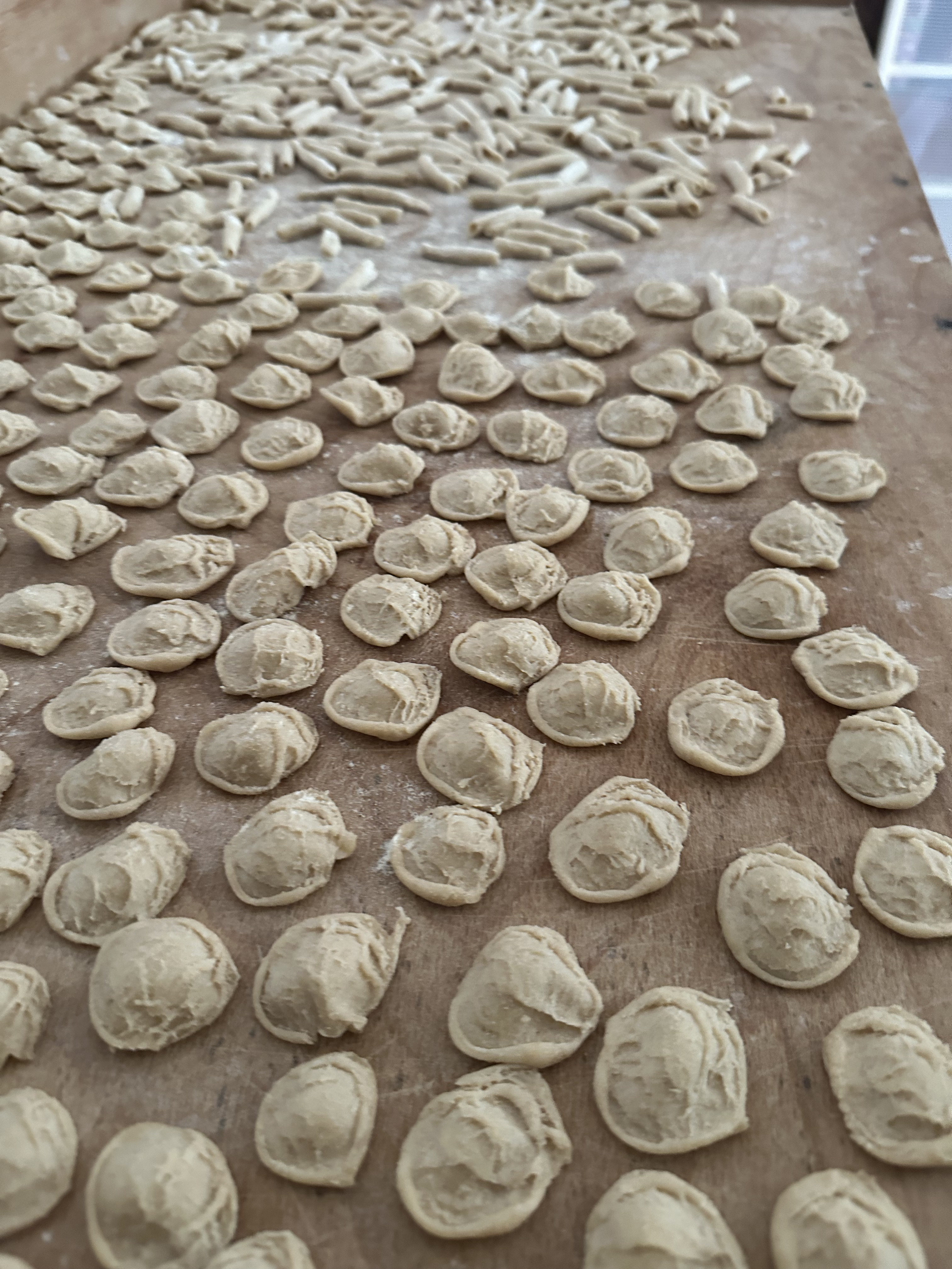 Orecchiette and maritati drying on the board